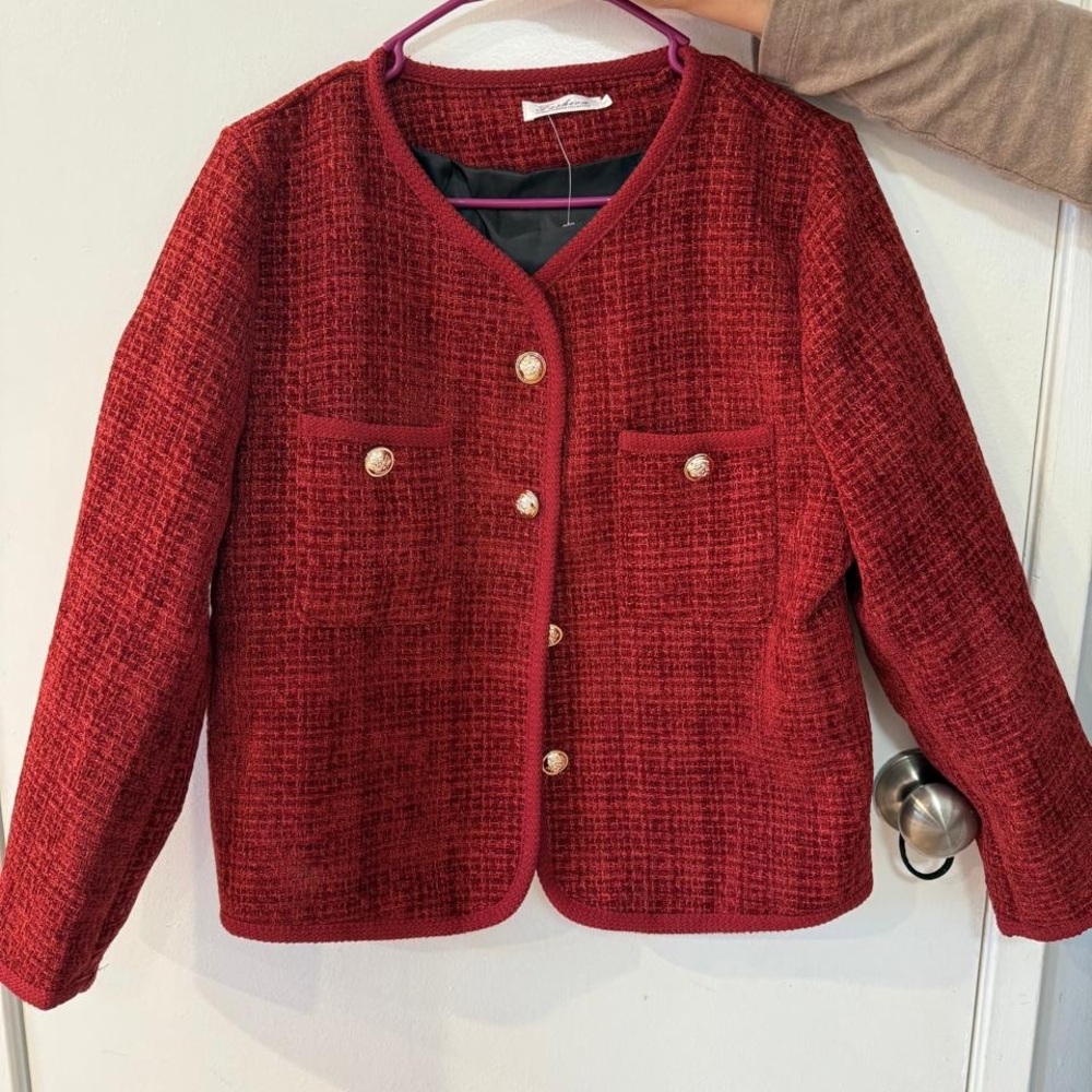 Red elegant jacket. New.